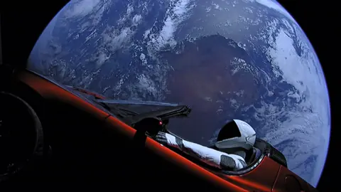 Making SpaceX and Tesla a single company has "a lot of merit," Musk says