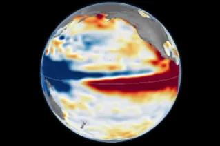 Side-by-side maps of the Pacific Ocean compare sea surface height anomalies in October 1997 (left) and October 2026 (right). In both, red areas of higher-than-normal sea surface height stretch across 